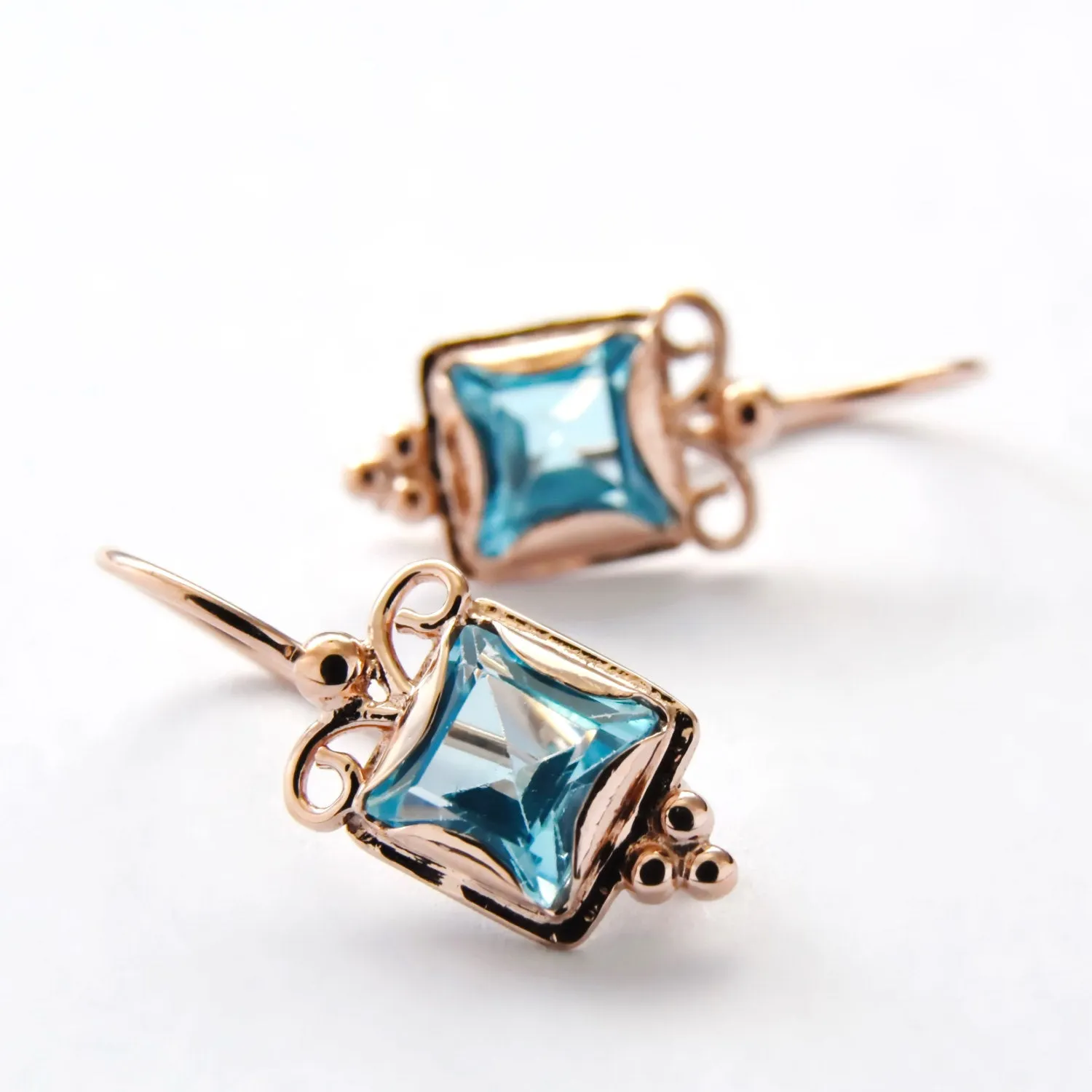 EG7811-4 Gold and Topaz square earrings